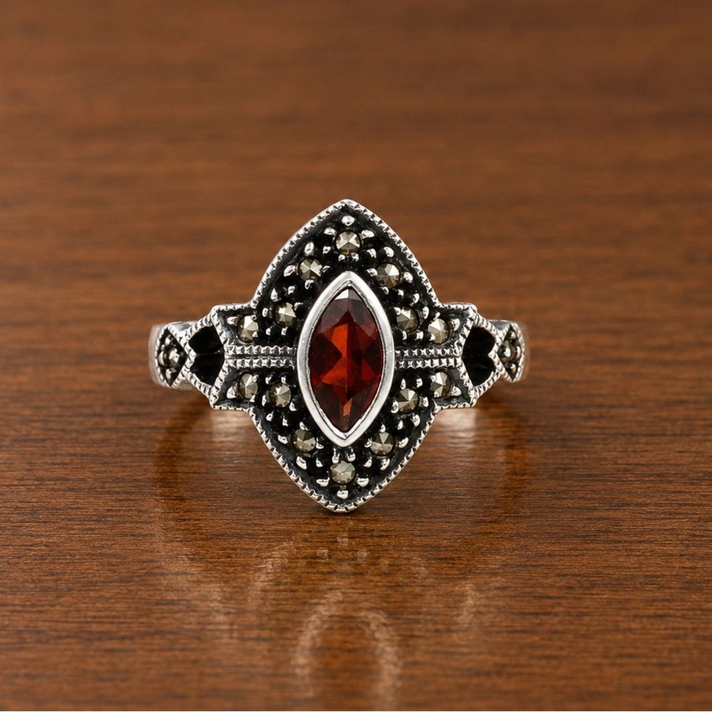 JUDITH JACK Sterling Silver Ring with Central Garnet Surrounded By Marcasite